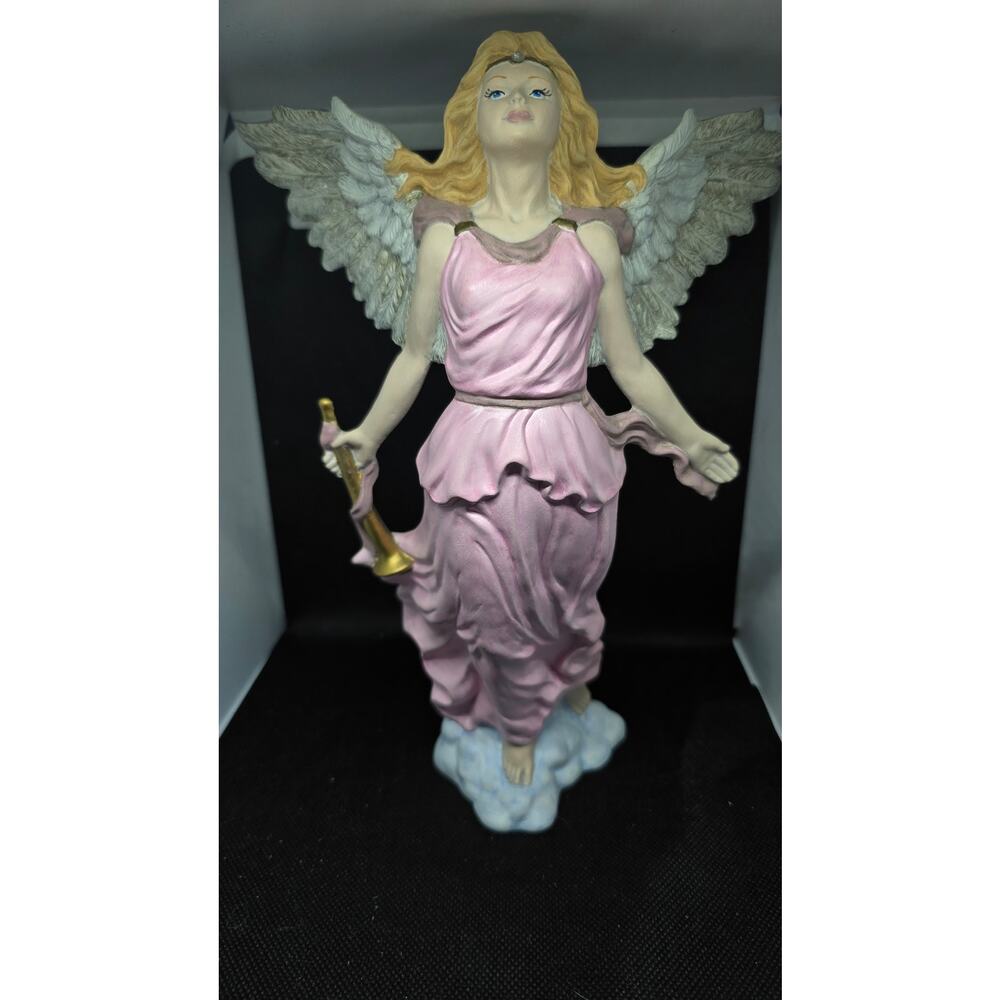 Porcelain Angel Figure 
Trumpet